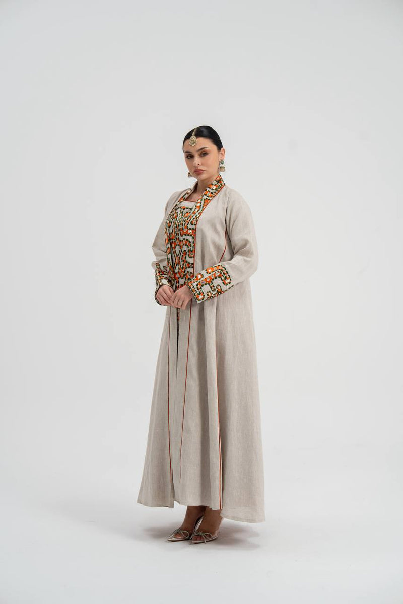 Linen abaya in light beige with embroidery. C:6743