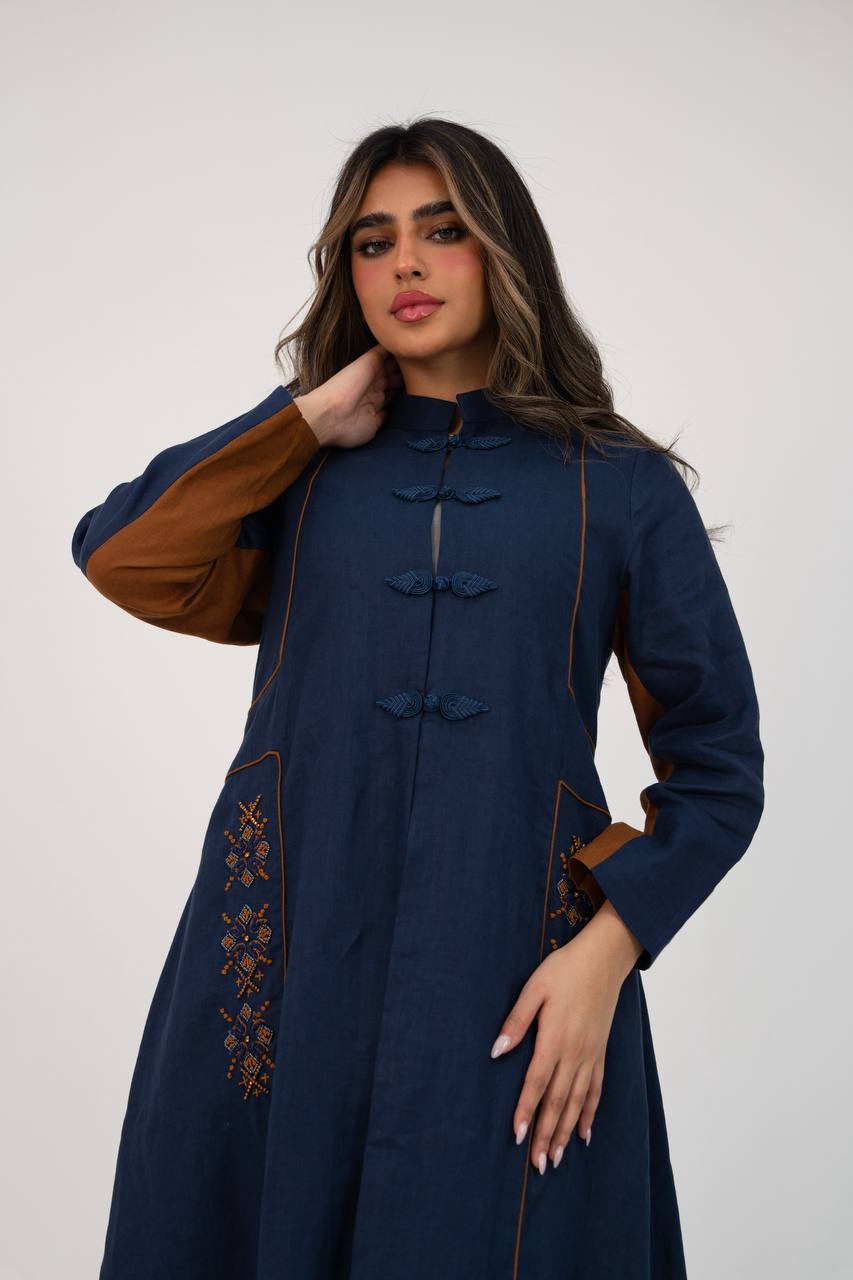 Linen abaya in navy blue with hand-stitched detail