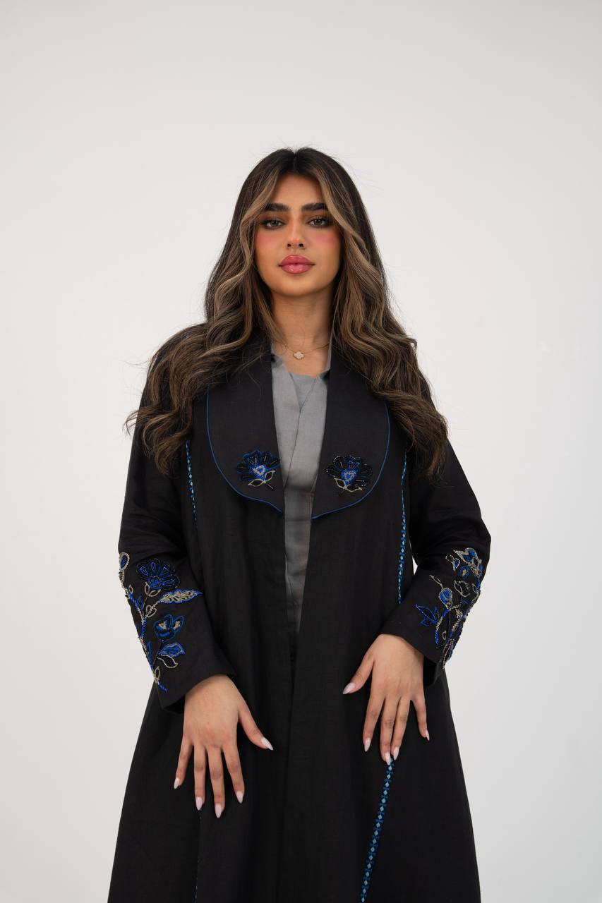 Black linen trench coat with hand embroidery and beading