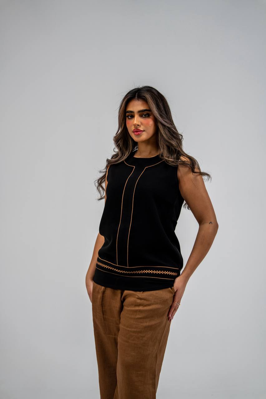 Black blouse and camel-colored pants set