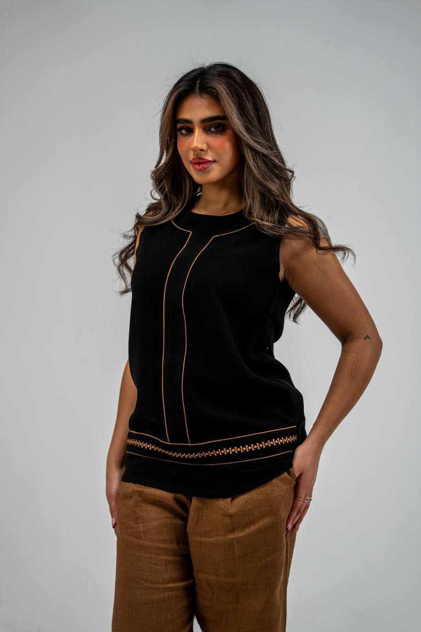 Black blouse and camel-colored pants set