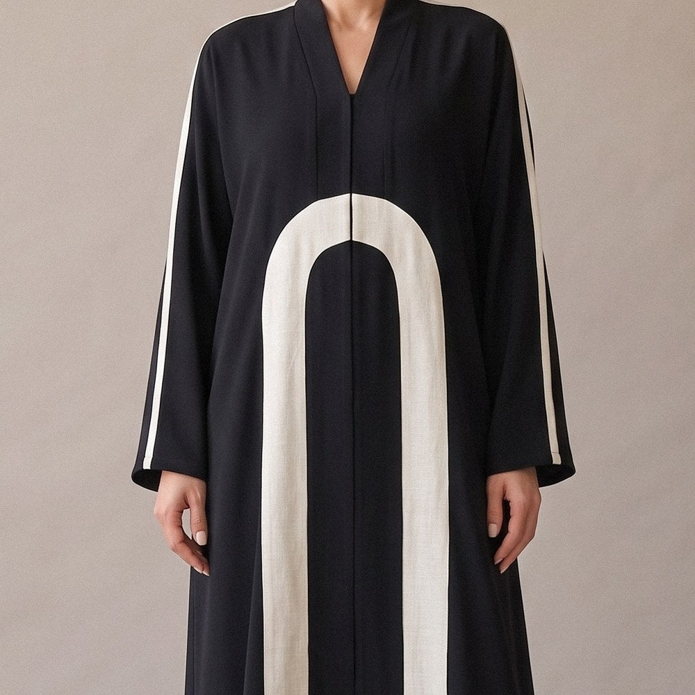 Close-up of the ivory arch on the Black Abaya with Ivory Arch.
