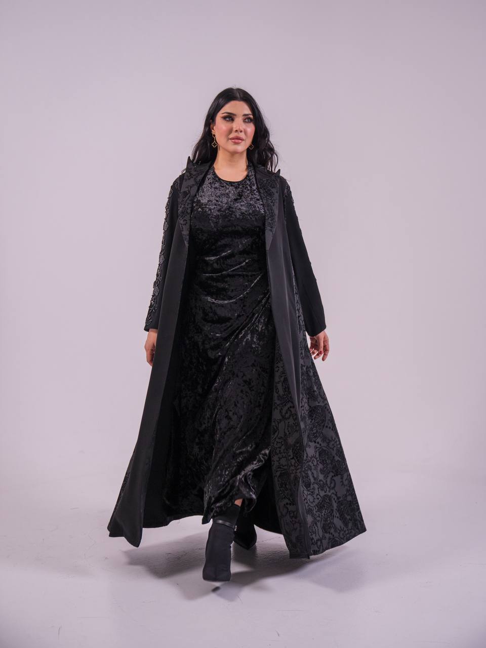 Crepe blazer abaya with black printed crepe and hand-stitched details.C:6733