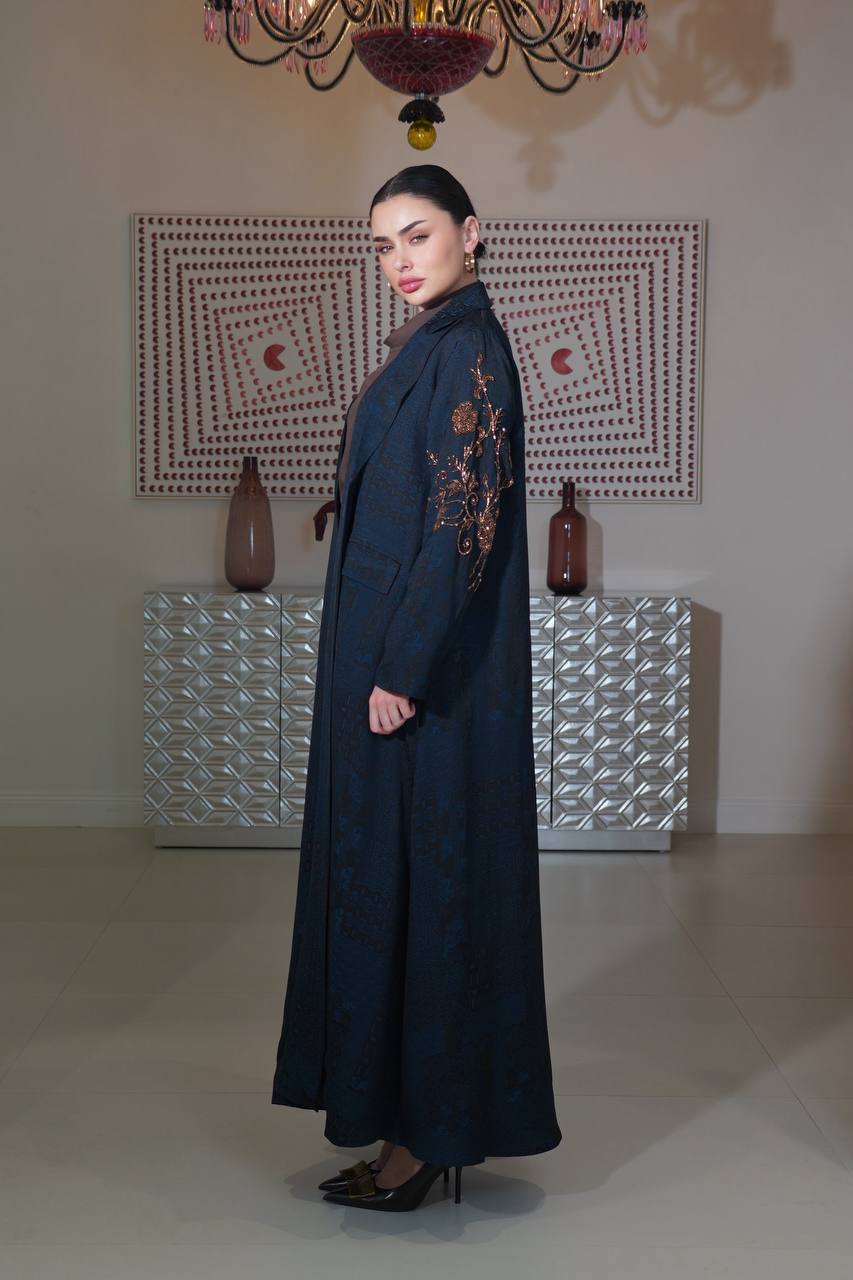 A navy blue jacquard silk blazer abaya with hand-stitched details.C:6754