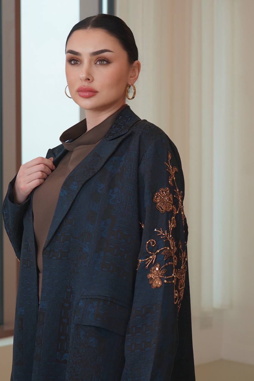 A navy blue jacquard silk blazer abaya with hand-stitched details.C:6754