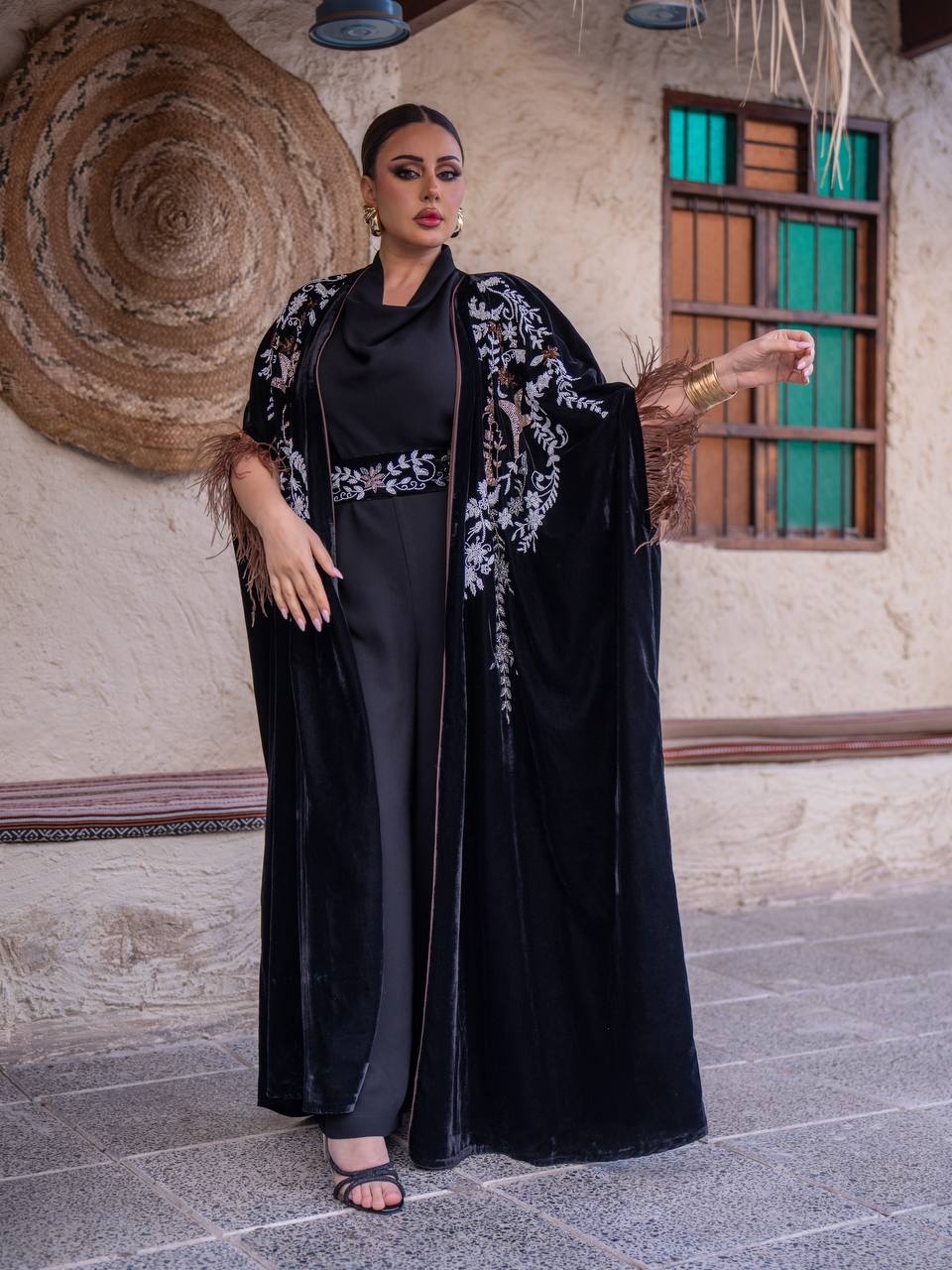 Velvet bisht and jumpsuit set in black with hand embellishment.C:6719