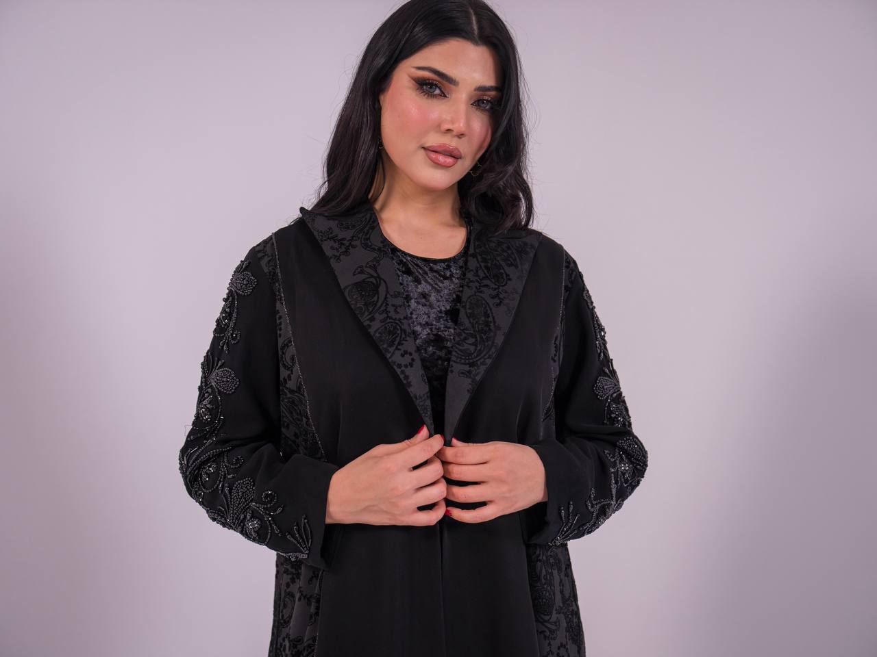 Crepe blazer abaya with black printed crepe and hand-stitched details.C:6733