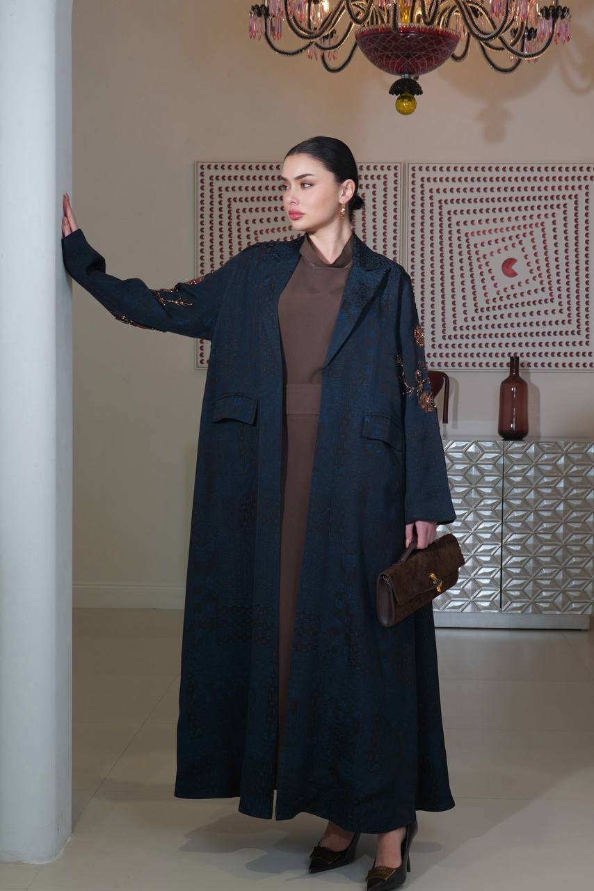 A navy blue jacquard silk blazer abaya with hand-stitched details.C:6754