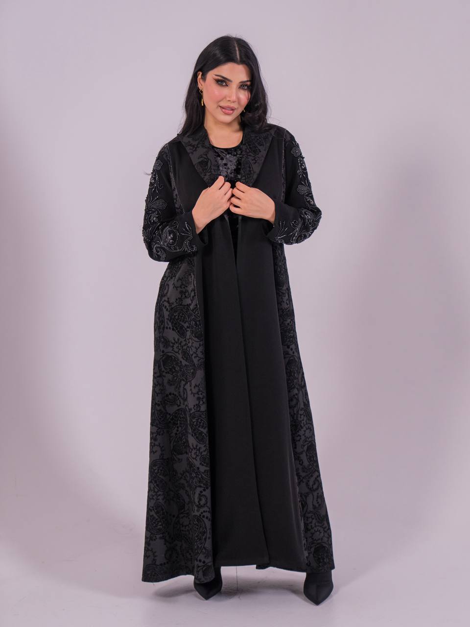 Crepe blazer abaya with black printed crepe and hand-stitched details.C:6733