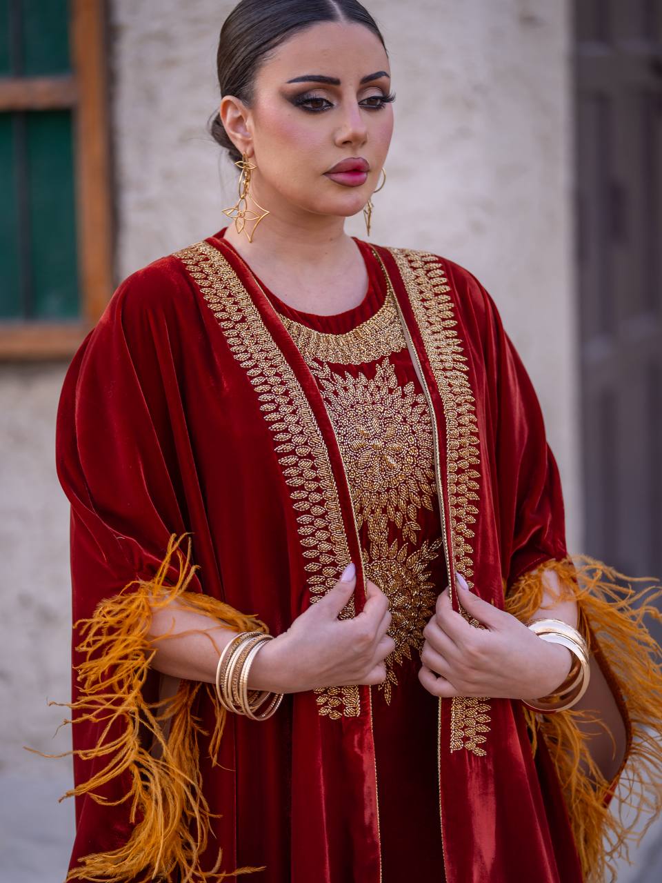 Bisht and dress set in burgundy velvet with hand embellishment.C:6714
