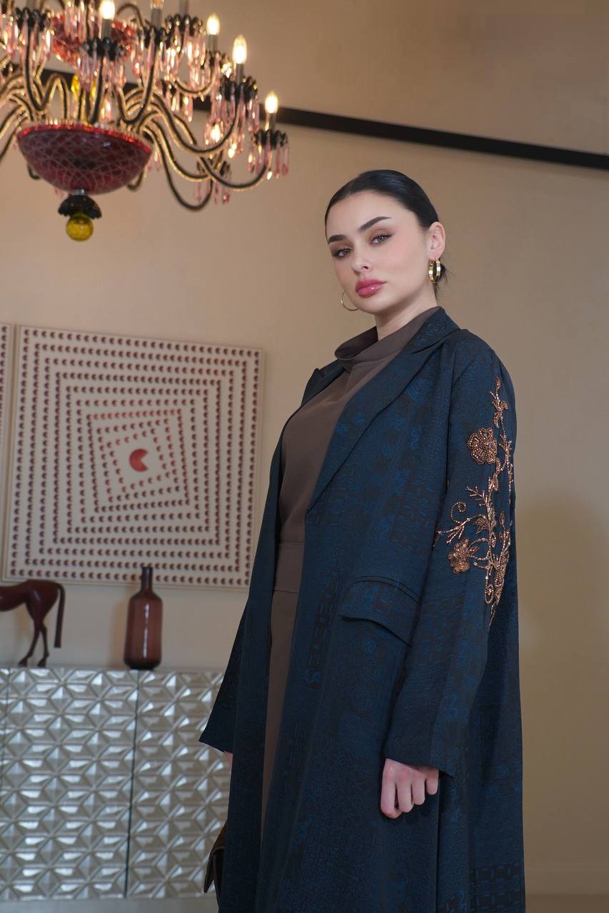 A navy blue jacquard silk blazer abaya with hand-stitched details.C:6754