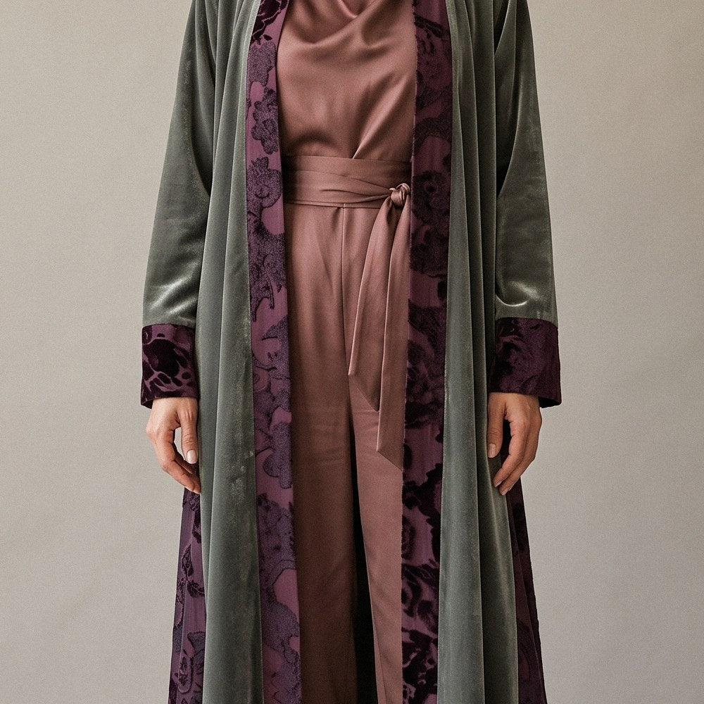 Close-up of the olive velvet and plum printed panels of the Olive Green Velvet Abaya.