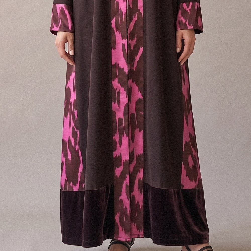 Close-up of the pink print and the dark velvet hem of the Brown Velvet Abaya.
