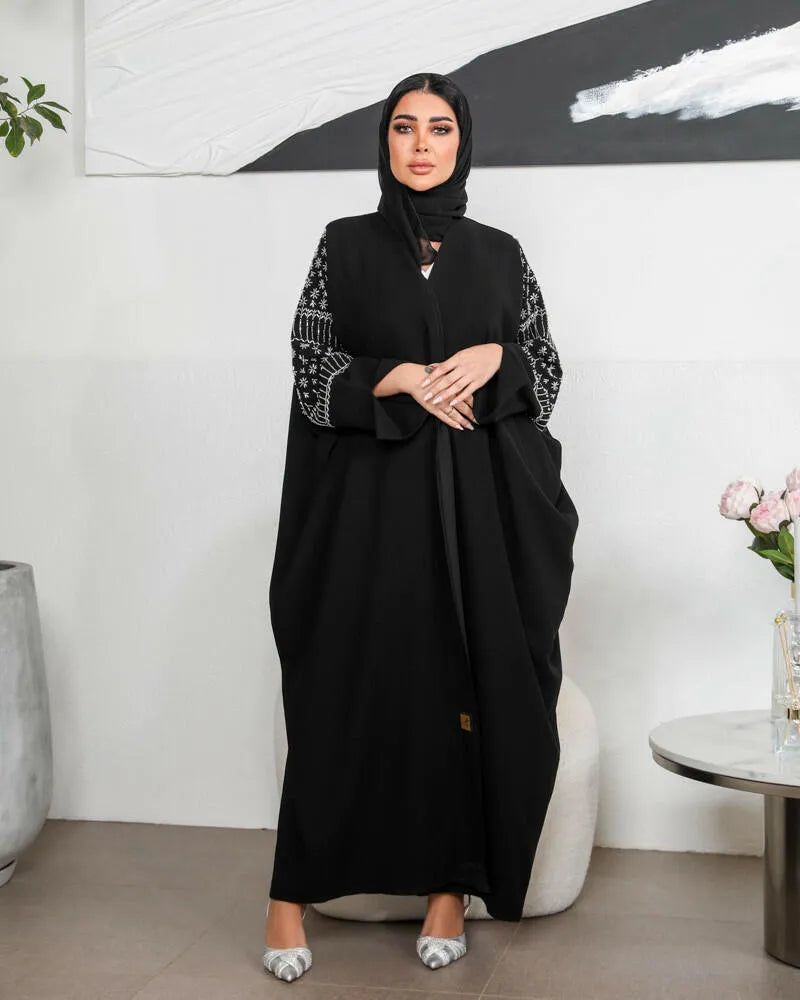 Free size crepe abaya with embroidery on the sleeves and lining