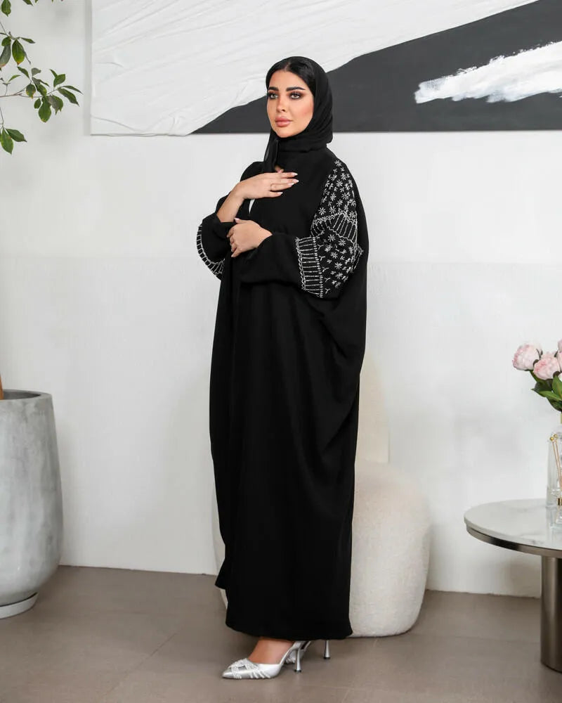 Free size crepe abaya with embroidery on the sleeves and lining