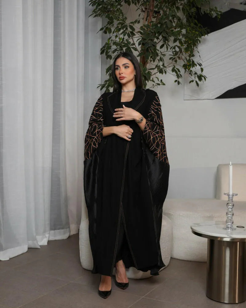 Free size crepe abaya with camel embroidery and pleats on the back