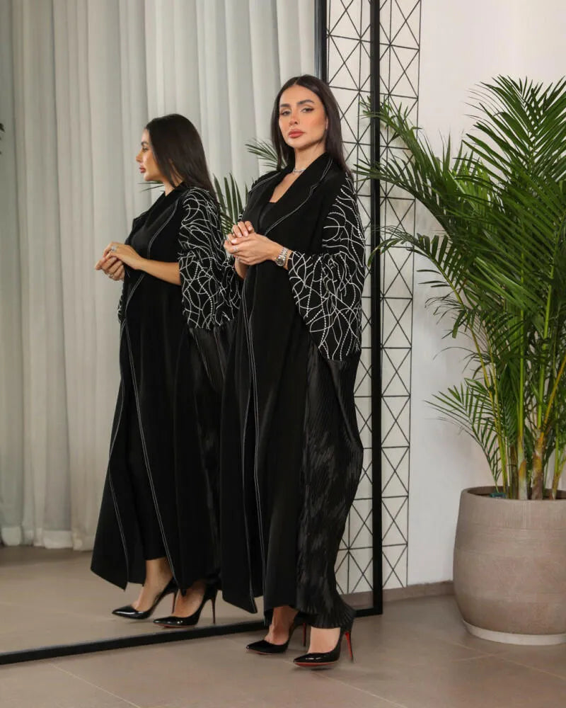 Free size crepe abaya with silver embroidery and pleats on the back