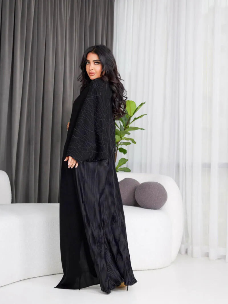 Free size crepe abaya with black embroidery and pleats on the back