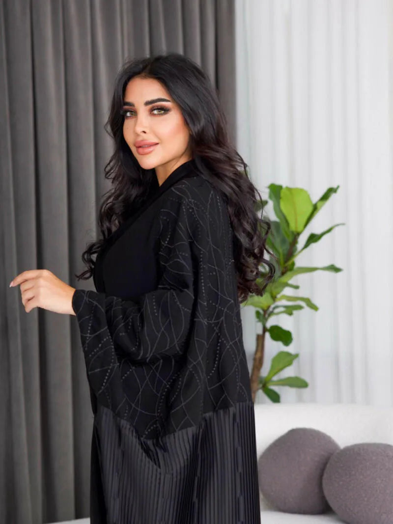 Free size crepe abaya with black embroidery and pleats on the back