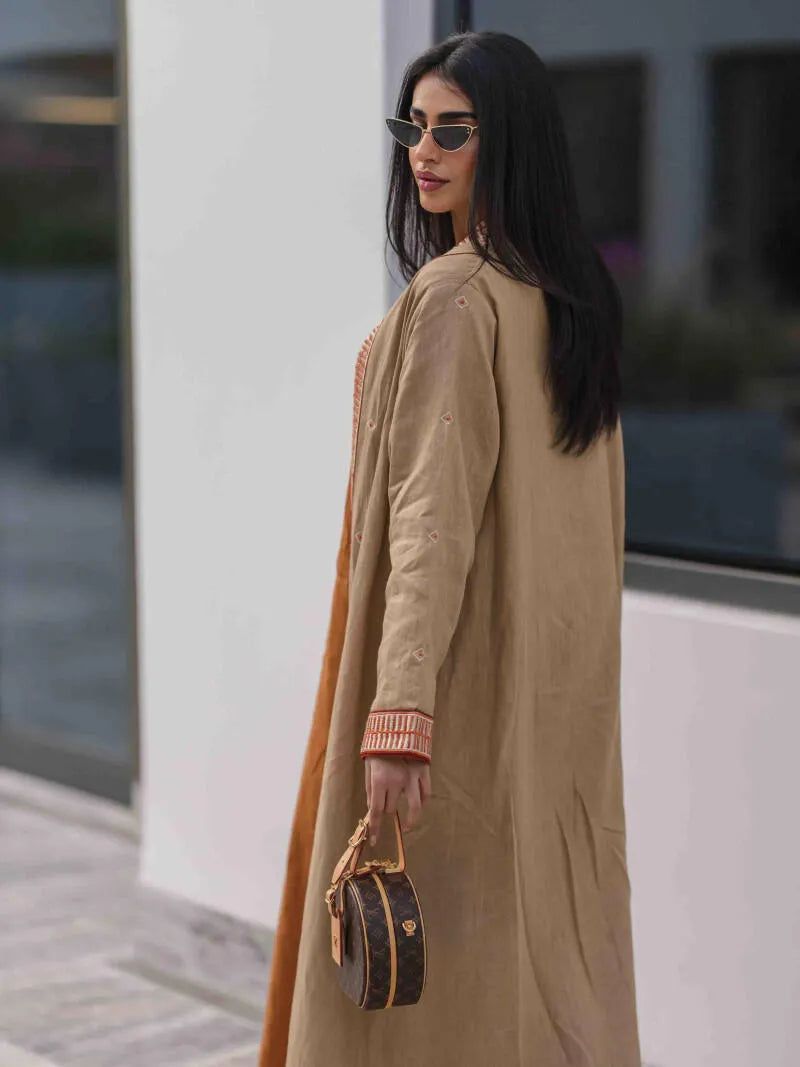 Beige linen abaya with embroidery and embroidery on the sleeves and collar