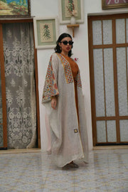 Beige linen cloak with colorful embroidery