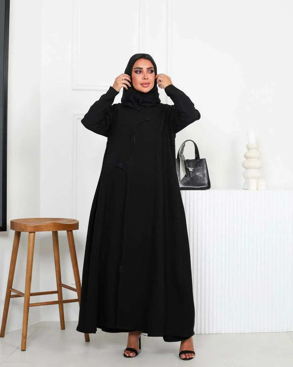 Black crepe abaya with buttons in the front