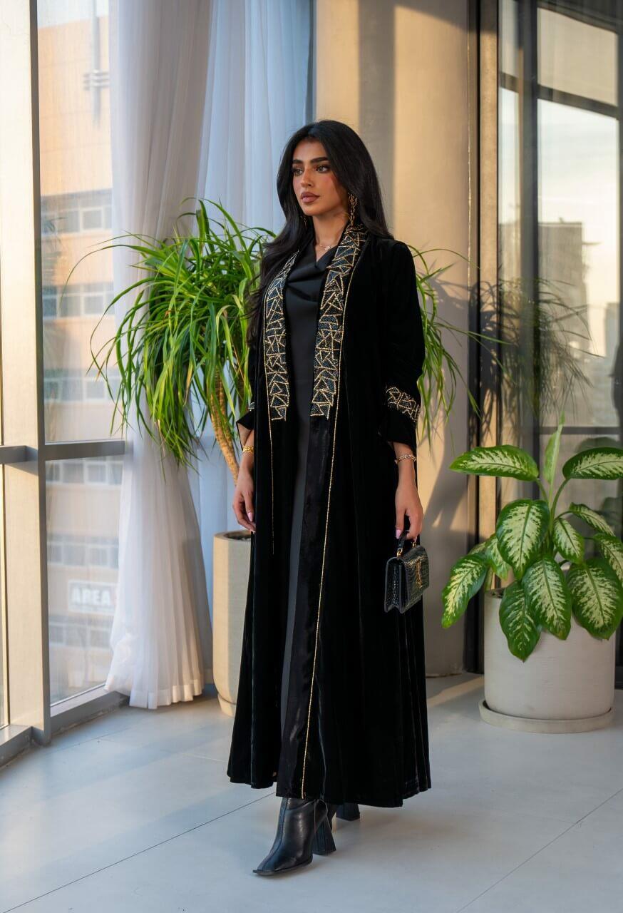 Black velvet abaya with gold embroidery in the front