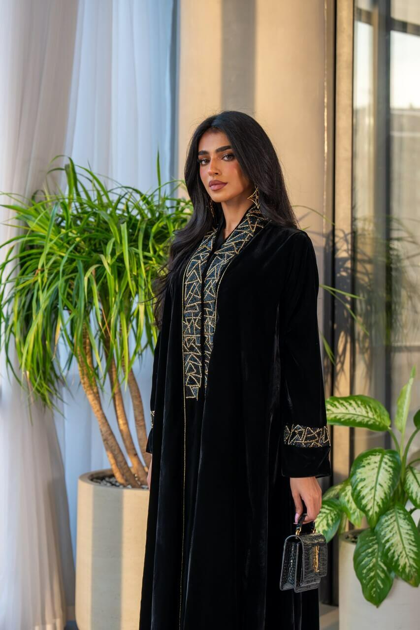 Black velvet abaya with gold embroidery in the front