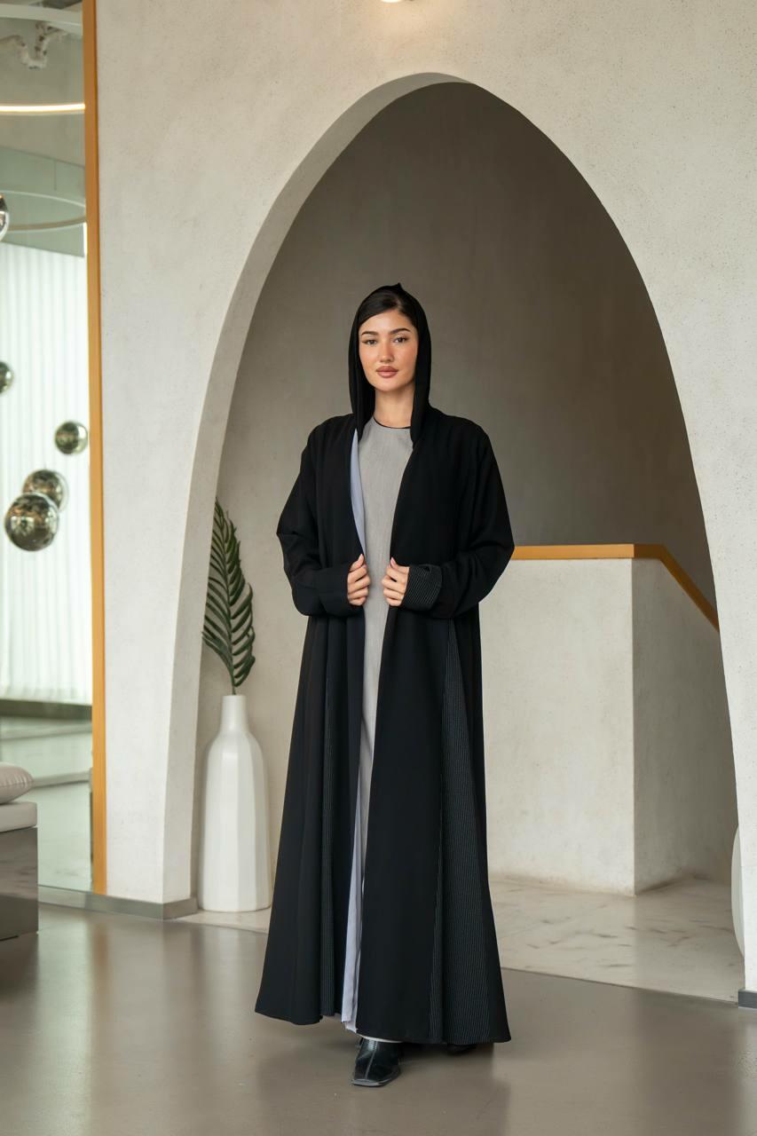 Practical black crepe abaya with striped trimming and lined with gray chiffon