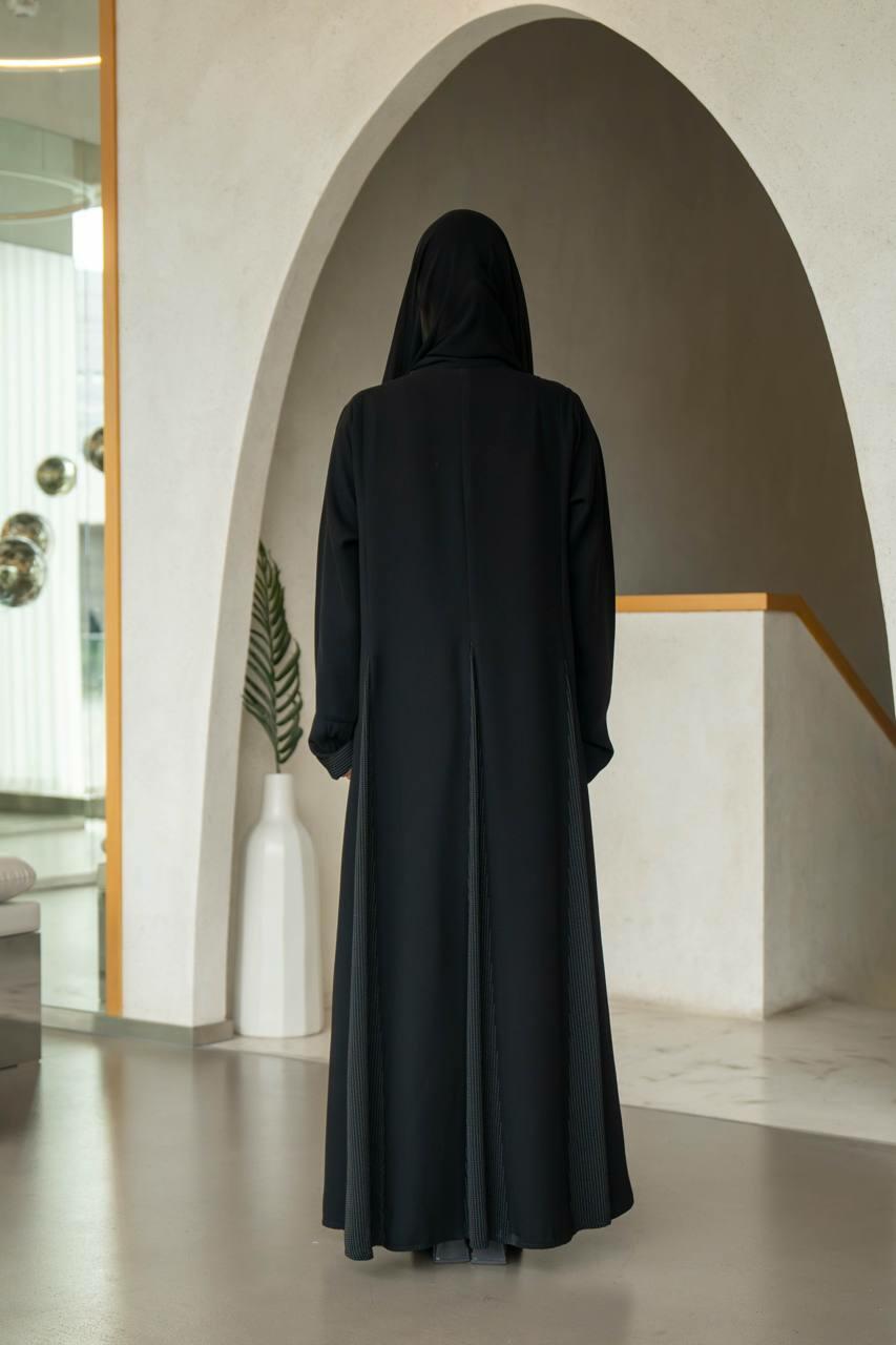 Practical black crepe abaya with striped trimming and lined with gray chiffon