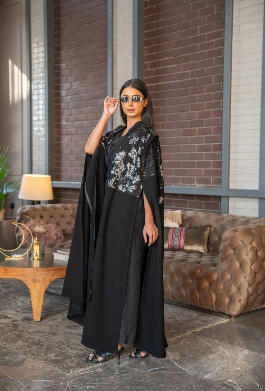 Black crepe abaya with elegant embroidery and a luxurious handmade sash