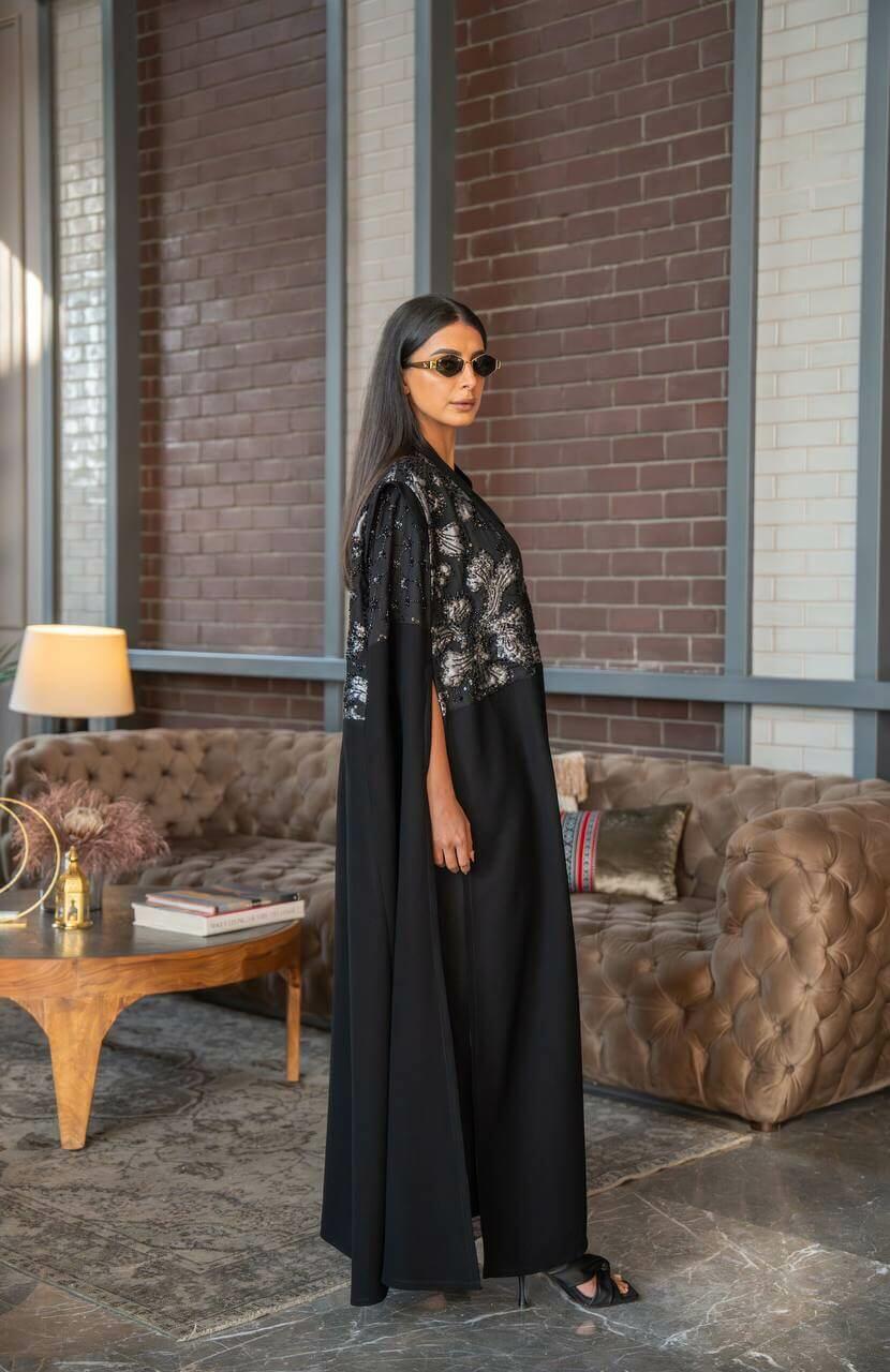 Black crepe abaya with elegant embroidery and a luxurious handmade sash