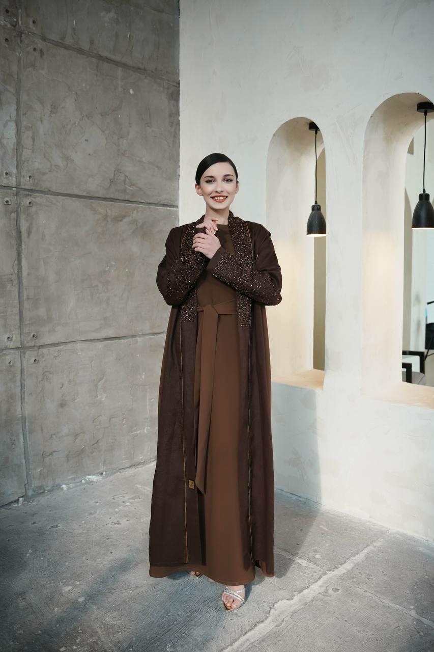 Dark brown linen abaya with the addition of light brown on the sides with luxurious hand embroidery