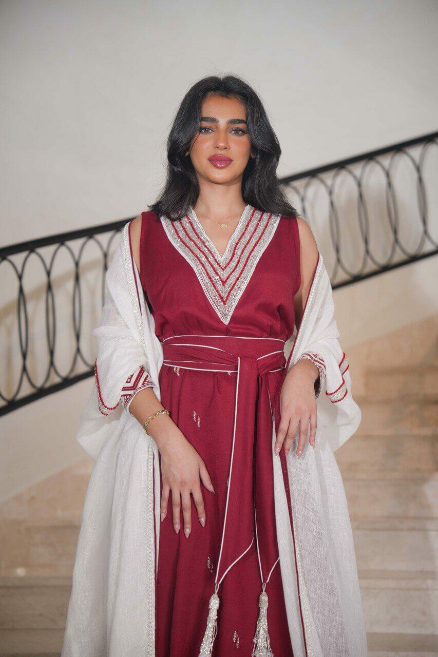 White burlap bisht with burgundy linen dress