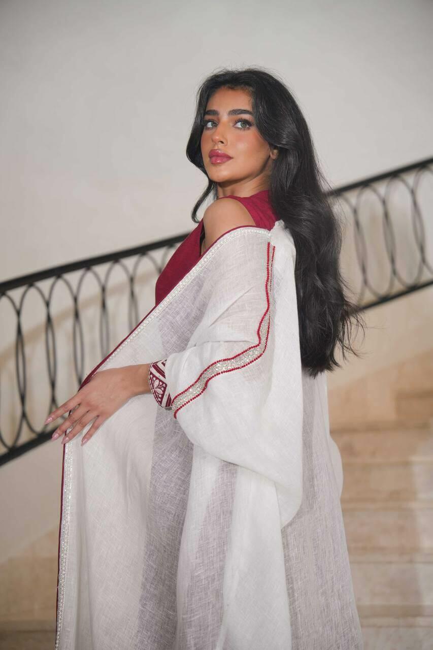 White burlap bisht with burgundy linen dress