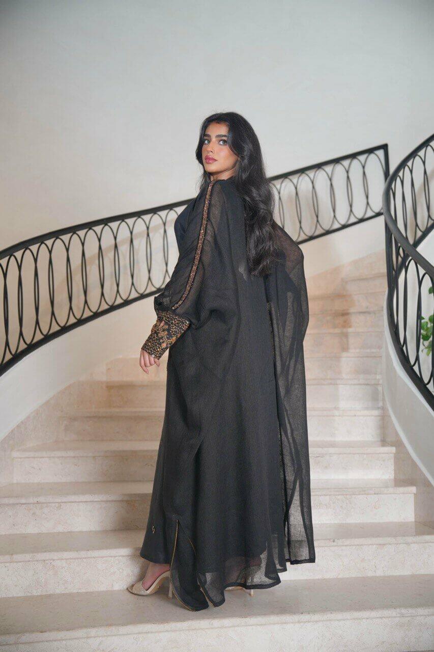 Black burlap bisht with black linen dress