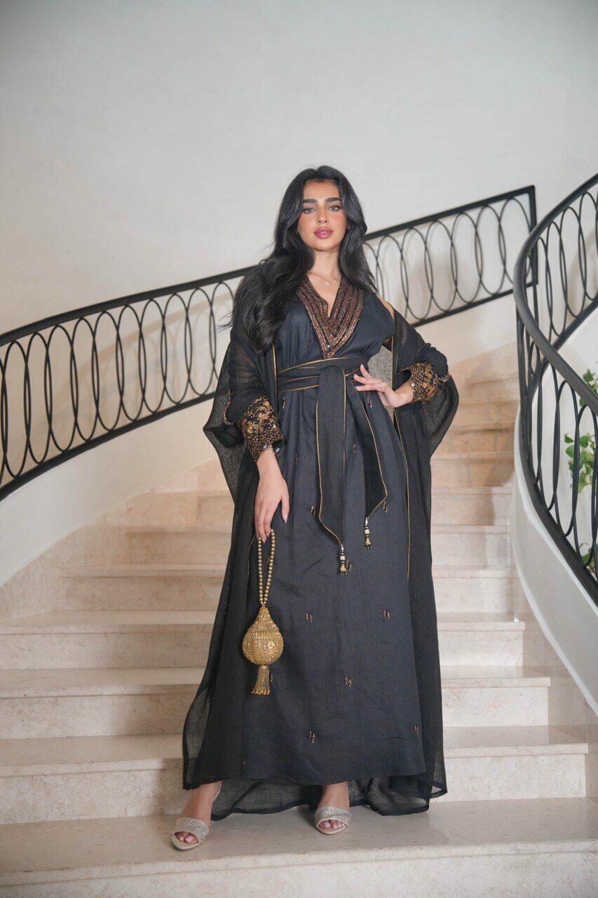 Black burlap bisht with black linen dress
