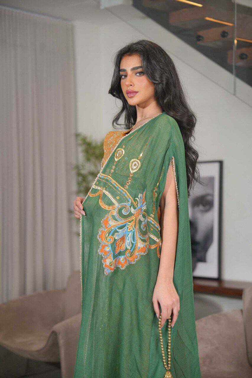 Green burlap bisht and a beige linen dress with orange