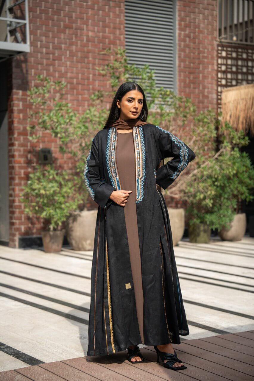 Black linen abaya with embroidery.