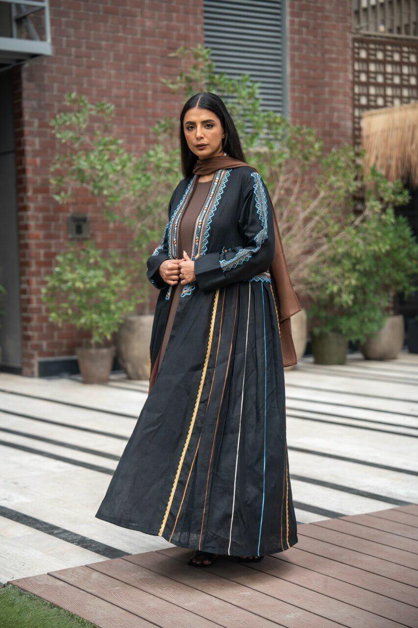 Black linen abaya with embroidery.