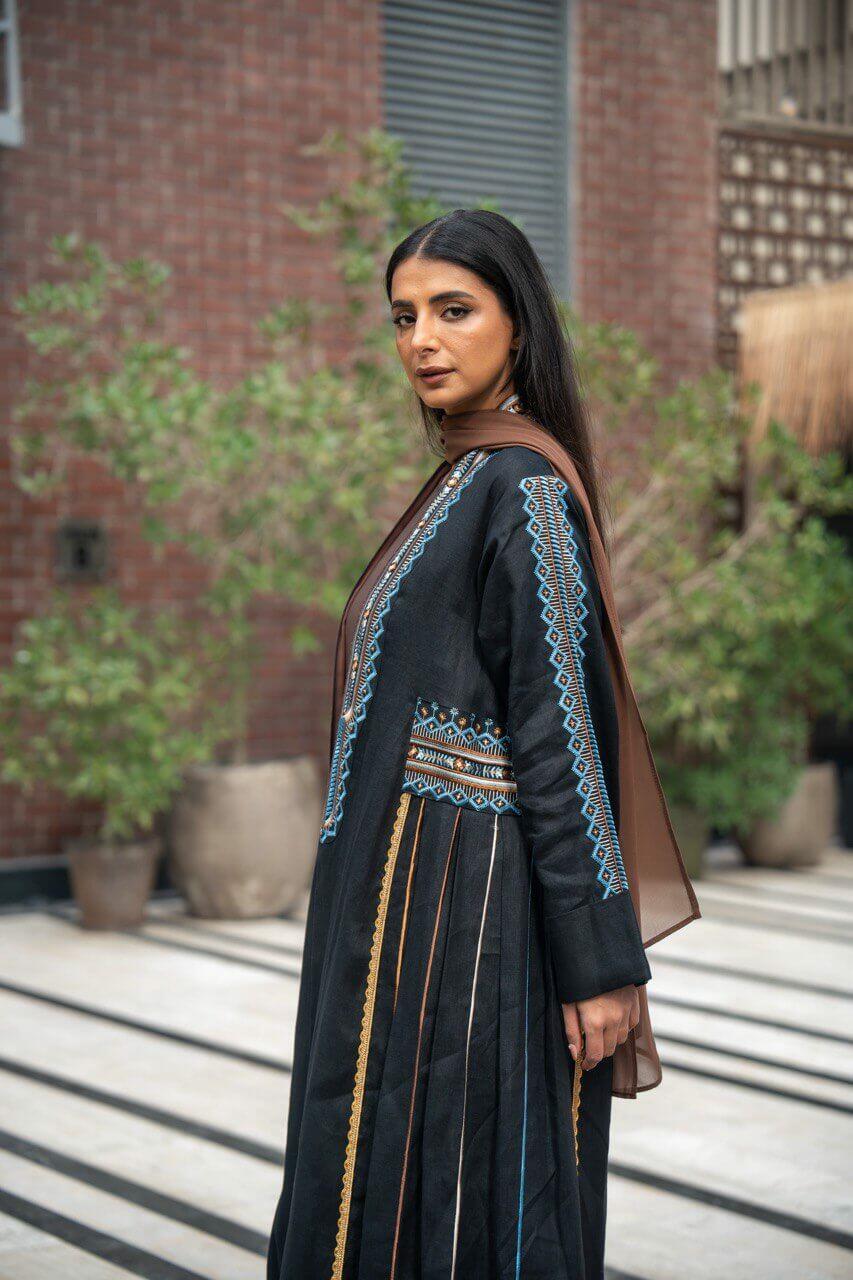 Black linen abaya with embroidery.