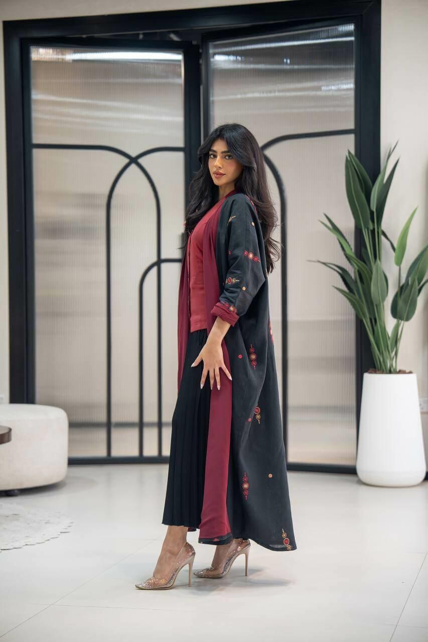 Black linen abaya  lined in burgundy with embroidery