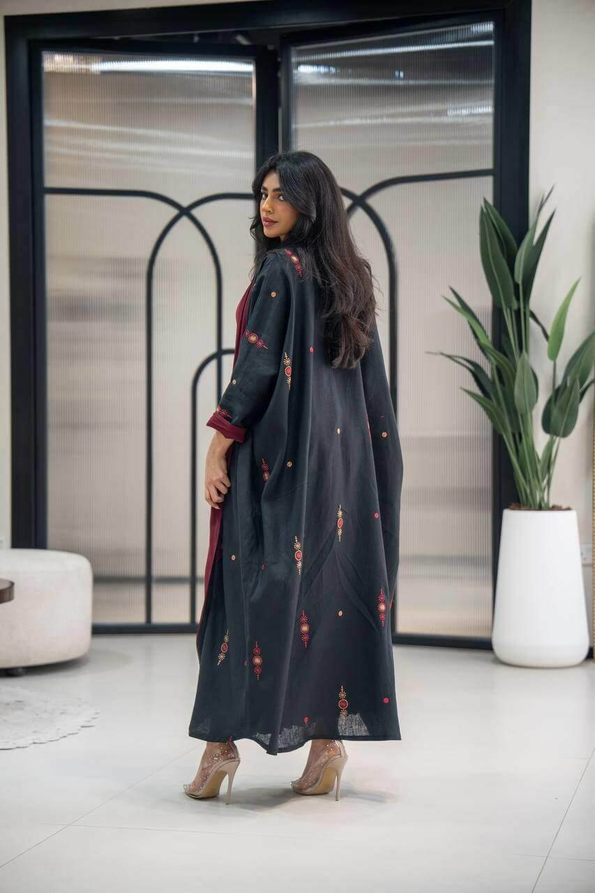Black linen abaya  lined in burgundy with embroidery