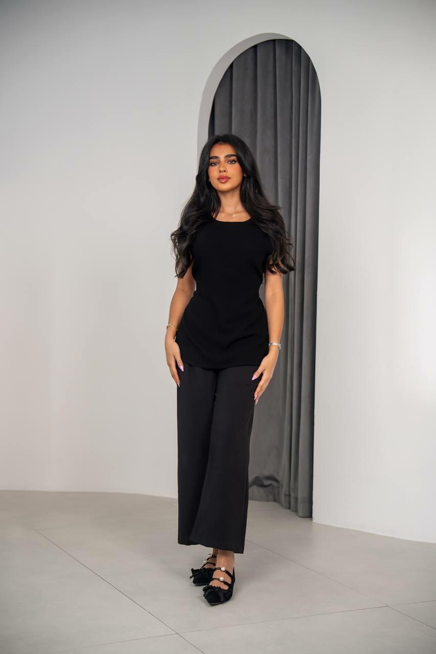 Set consisting of a blouse and pants black crepe fabric