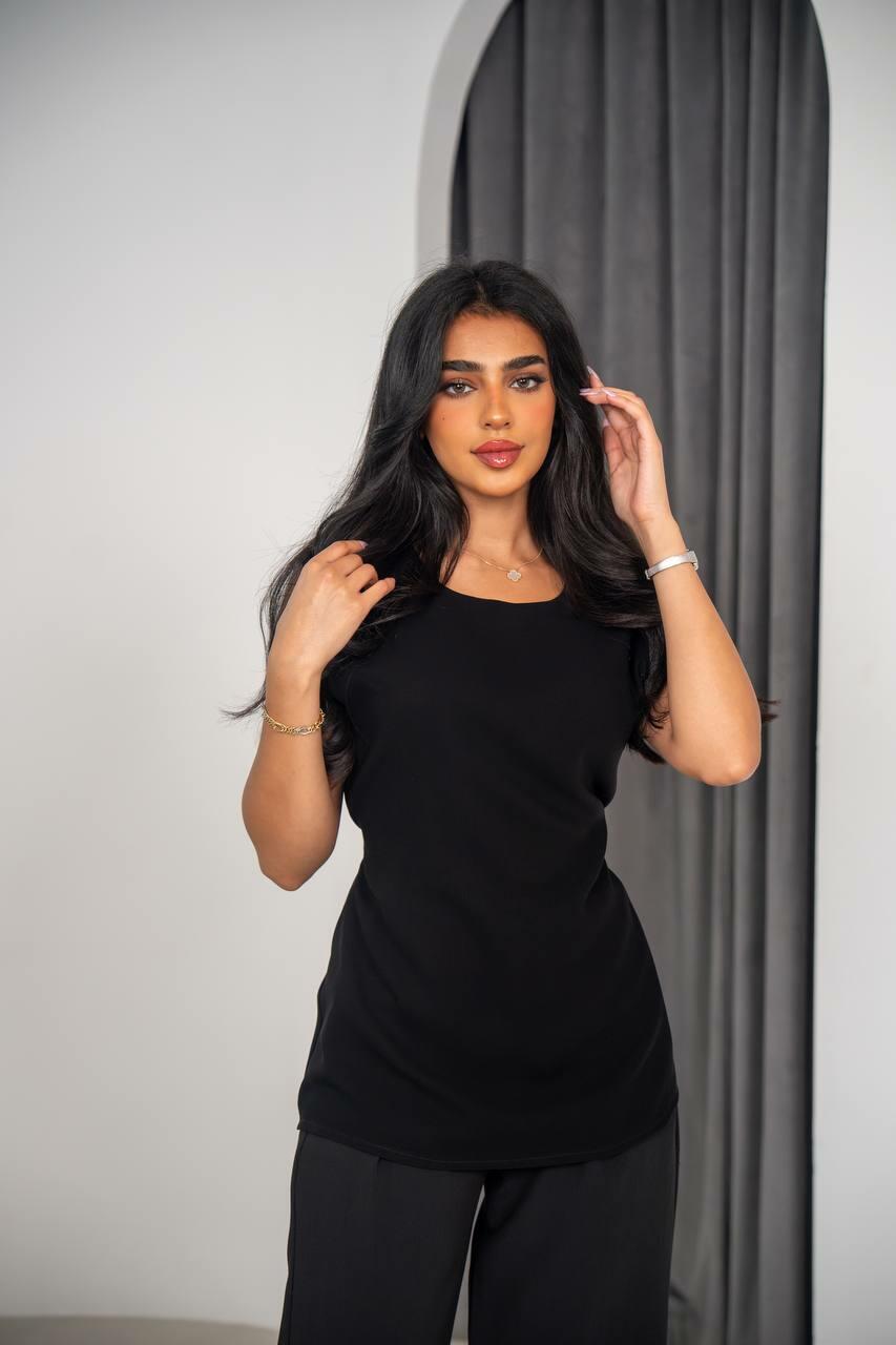 Set consisting of a blouse and pants black crepe fabric