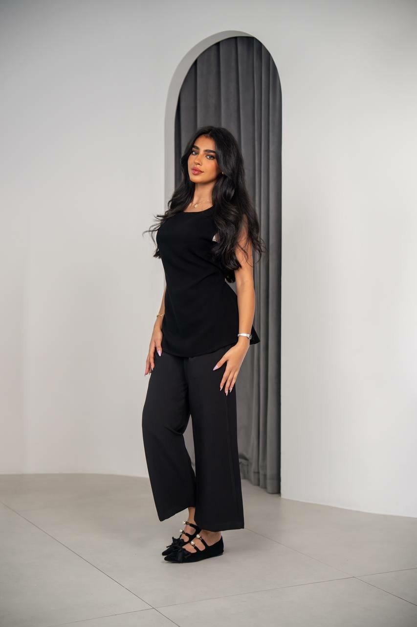 Set consisting of a blouse and pants black crepe fabric