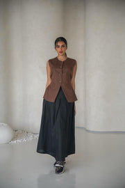 set consisting of a brown vest and a black skirt made of natural linen