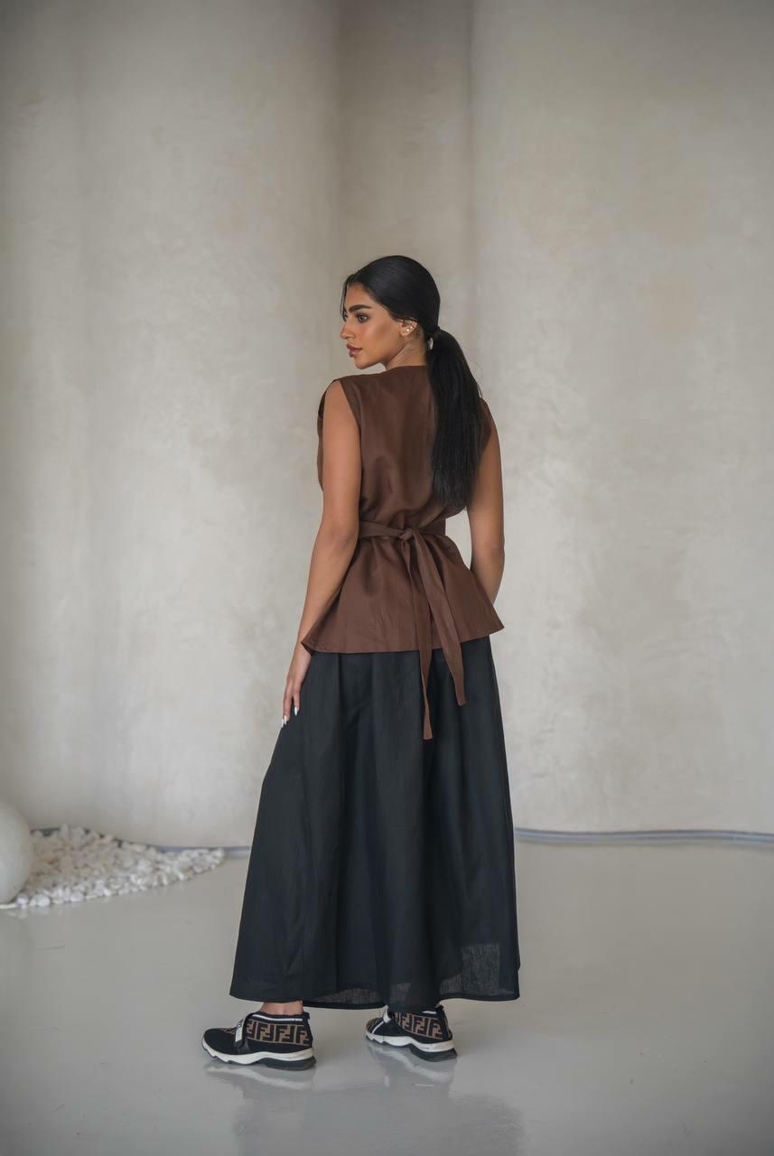 set consisting of a brown vest and a black skirt made of natural linen