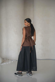set consisting of a brown vest and a black skirt made of natural linen