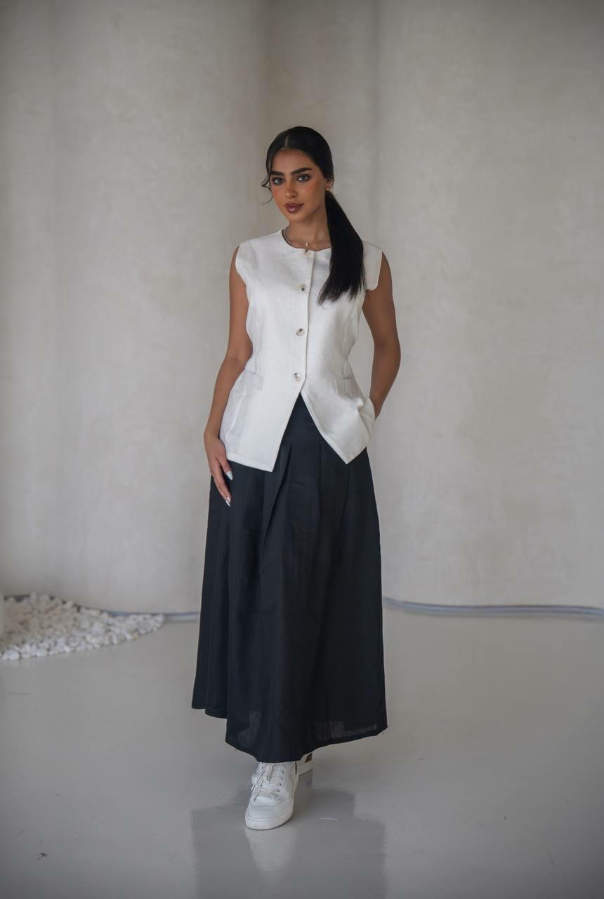 set consisting of a white vest with a black skirt made of premium linen